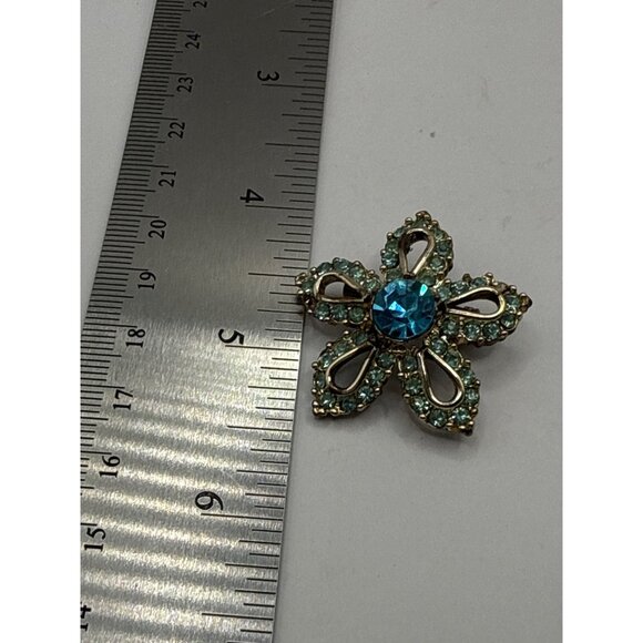 Vintage Gold Tone Flower Brooch With Blue Rhinestones - Picture 2 of 5